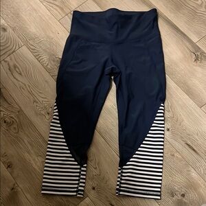 X xersuion capris. Navy blue with white stripes on calves size Small fitted